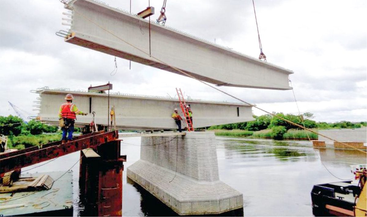 Erection of a haunched pier segment at pier 1 on the Christina River. 