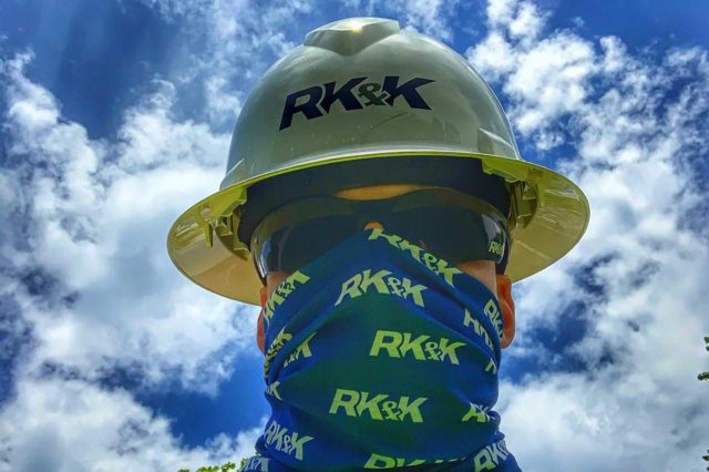 Josh Golomb in the field wearing his RK&K hardhat and face covering.