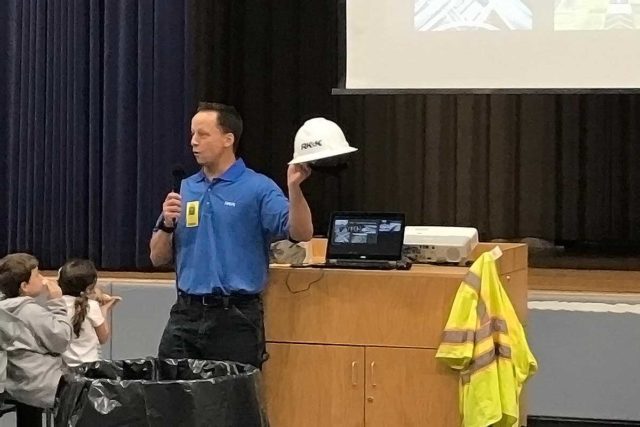 Josh Golomb presents to his son's 4th grade class.