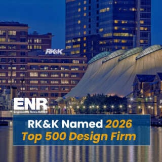 Night waterfront skyline with RK\&K building and text: ENR Engineering News-Record, RK\&K Named 2026 Top 500 Design Firm.