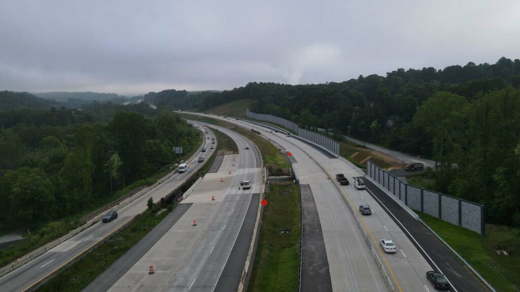 a highway with many cars