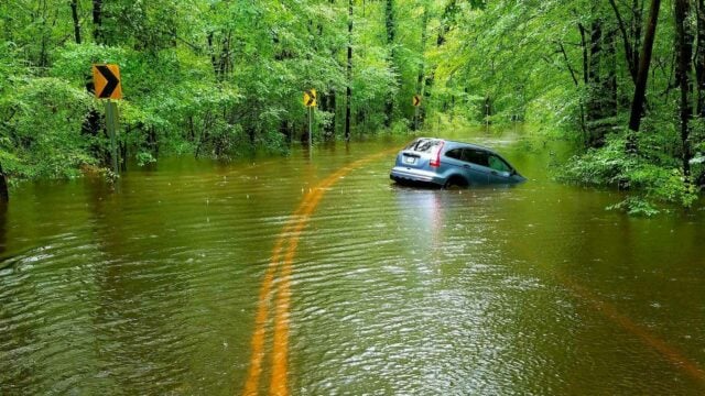 A car stuck in the flooding of the Upper North River.