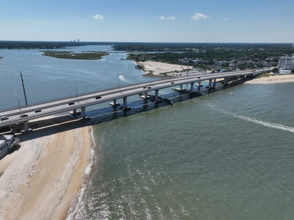 A bridge spanning mainland to a barrier island.