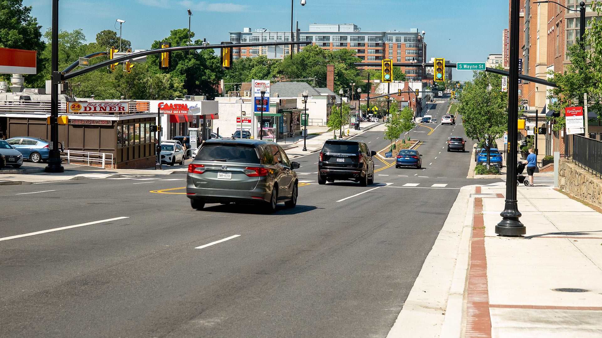Completed multimodal transportation improvements along a commercial corridor, including pedestrian infrastructure, roadway upgrades, and enhanced traffic operations.