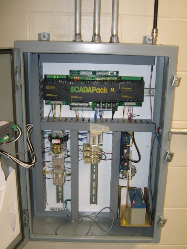 SCADA control cabinet with a controller, wiring, and communications equipment used for remote monitoring and automation of water system operations.